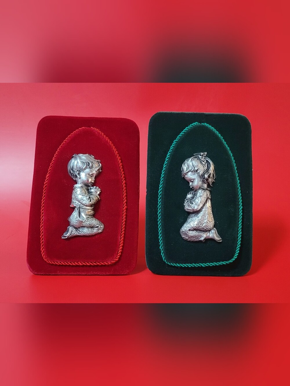 Petro Cesllato Pewter Praying Children Wall Plaques on Red and Green Velvet